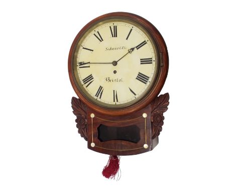 Mahogany single fusee 12" drop dial wall clock signed Schwer &amp; Co, Bristol, within a turned surround over foliate carved 