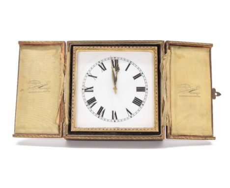 Goldsmiths &amp; Silversmiths eight days gild metal strut clock, the white dial with Roman numerals, easel back, case no. 197