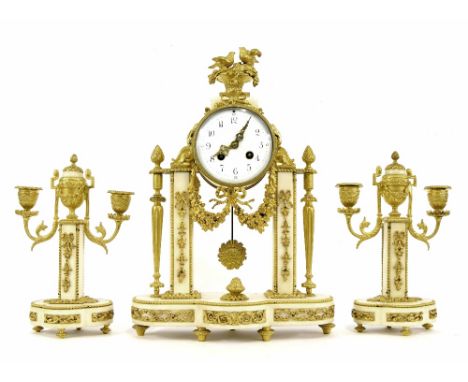 French white marble and ormolu mounted two train mantel clock garniture, the Samuel Marti movement striking on a bell, the 4"