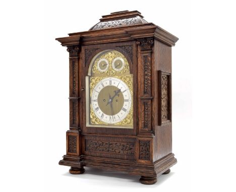 Oak boardroom double fusee bracket clock striking the hours and quarters on five gongs, the 9" brass arched dial with subsidi