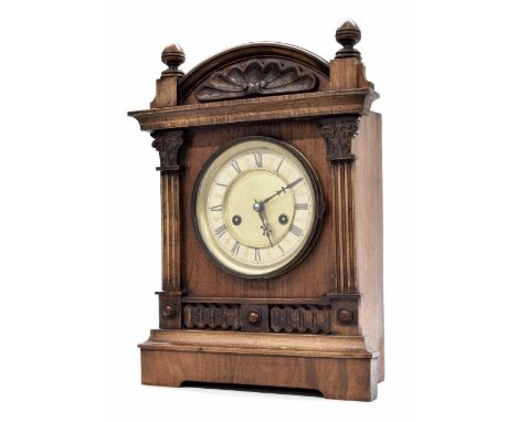 H.A.C. fourteen day strike mantel clock, the 5" cream chapter ring enclosing a gilt recessed centre, within a pillared carved