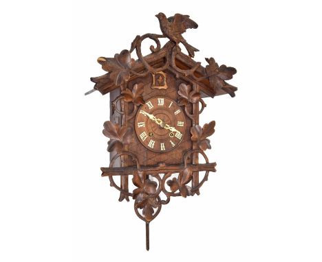 Good Black Forest two train fusee cuckoo clock, the movement back plate stamped GHS, the 6" dial within a chalet case with ca