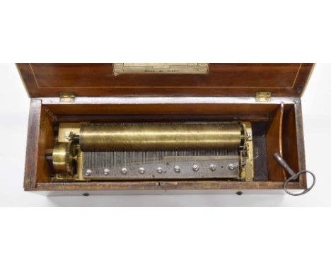 Rosewood music box, the 12" cylinder playing on six airs, with original tune sheet, within an inlaid case, 20" wide