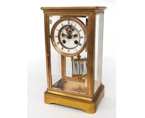 French gilt brass four glass two train mantel clock striking on a bell, the 3.75" chapter ring enclosing a recessed visible e