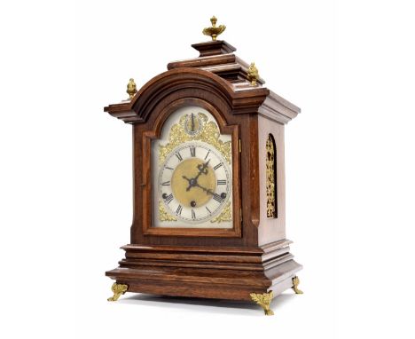 German oak three train bracket clock, the 6" silvered arched dial with strike/silent subsidiary dial to the arch, the movemen