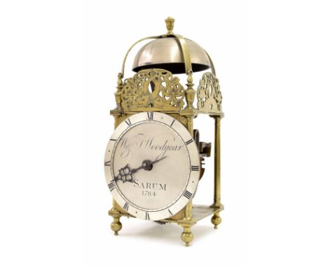 Interesting English brass lantern clock, the 6.5" silvered chapter ring enclosing a silvered centre signed W &amp; J Woodyear