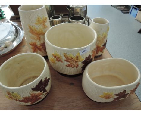A selection of Sylvac 'Autumn Leaves' bowls and vases