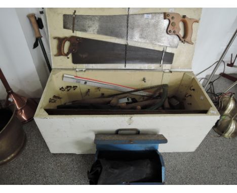 A vintage wooden carpenters tool box and tools, also a metal tool box with punches, and various tool roles