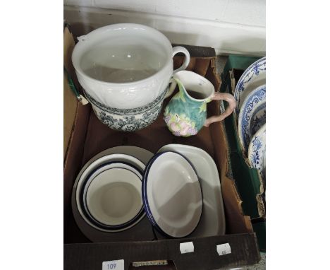A selection of enamel dishes and plates etc 