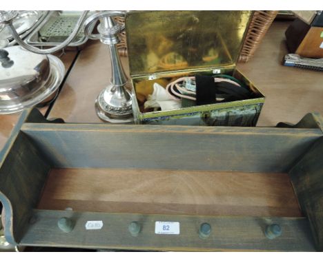 A selection of items including treen rack, candle stick and tin with sewing items. 