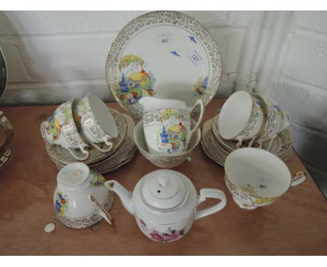 A vintage Imperial part tea service in gilt with country cottage design (20 pieces) and teapot with pink rose design