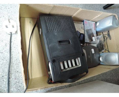 A selection of vintage tech including CD player, tape recorder and calculators