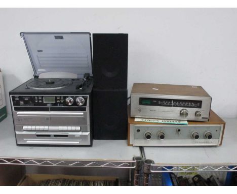 Ferrograph F307 Vintage Amplifier, Rotel RT-222 vintage tuner, and a steepletone music center (all untested).