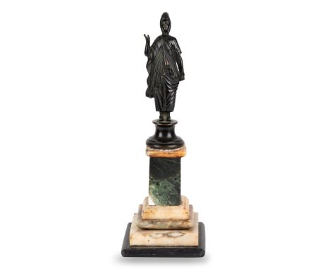 Antique patinated bronze sculpture depicting a draped female character wearing a curious pointed headdress; base in polychrom