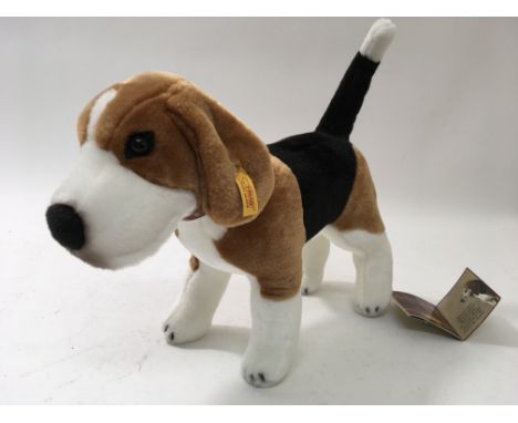 A Steiff beagle with stud and tags