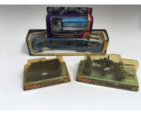 A boxed Dinky Toys Leopard Recovery Tank No 699, a boxed 88 mm Gun No 656, a boxed Siku volvo LKW No 2517 and a boxed Corgi c