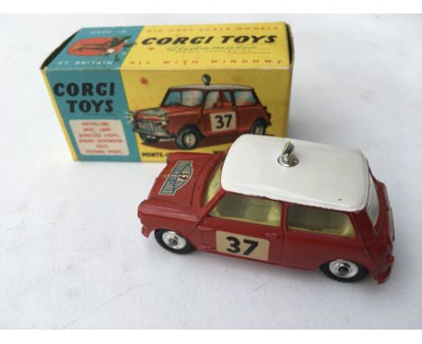 A boxed Corgi Toys Monte Carlo BMC Mini Cooper " S " No 317 in red white a white roof and lamp