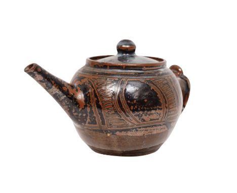 Teapot, circa 1960sStoneware with iron glazesImpressed seal for Abuja pottery and potter (unknown).11 h x 21 cm spout to hand