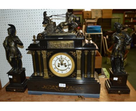A classical slate clock garniture in Roman form with bell strike
