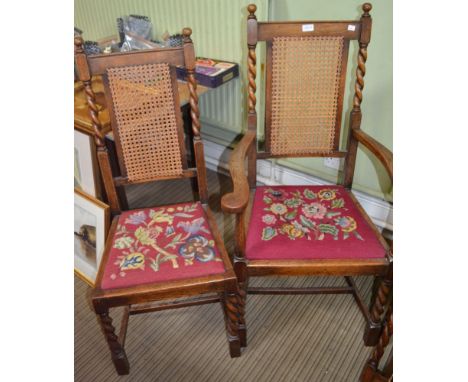 Six oak framed chairs with cane backs and tapestry seats