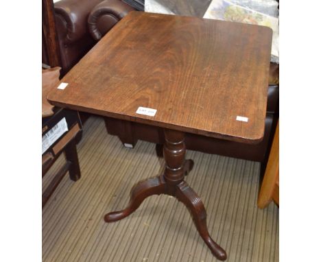 A 19th century mahogany snap top wine table on tripod supports