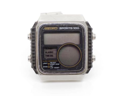 Seiko "running man" digital watch circa 1980s. Marked Sports 100, D138-5040, later non Seiko flip lock bracelet. Not working.