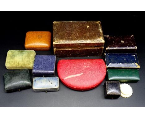 Fourteen vintage jewellery boxes includes a xylonite box marked Casecraft, Mikimoto, Saunders Ltd London Sydney, Paul Brown M