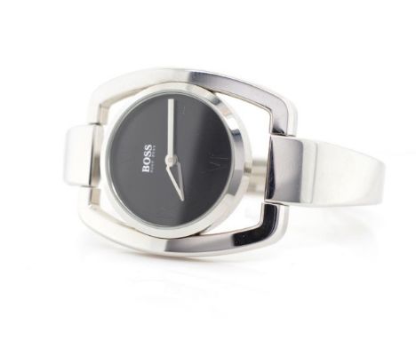 Ladies Hugo Boss bangle watch in stainless steel, approx inside width 52mm. Quartz movement not working when tested. With box