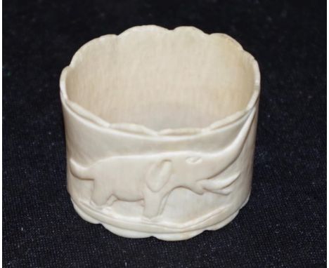 Early Indian carved ivory elephant napkin ring circa 1930, height 3.5cm approx. NB. This item cannot be exported.