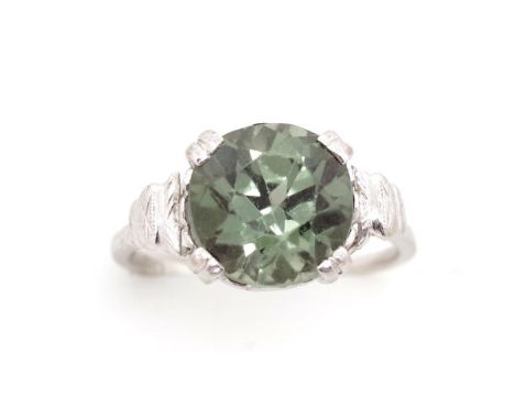 Green gemstone and 9ct white gold cocktail ring marked 9ct, the gemstone tests as green tourmaline with slight wear to the ta