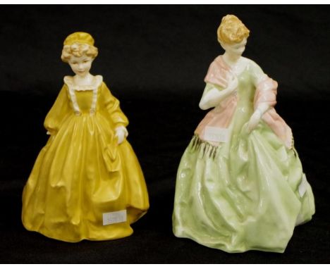 Two Royal Worcester young lady figurines including Grandmother dress, and First Dance, height 18.5cm approx