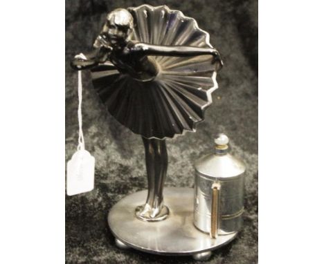 Rare Early chromed metal figural cigarette lighter depicting standing woman dancer, with attached cigarette lighter, (includi