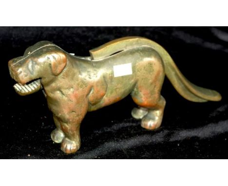 Vintage cast metal nut cracker in the form of a dog, width 26cm approx