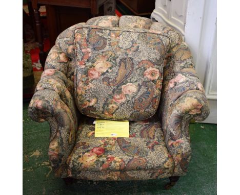 A modern floral button back tub chair by Lincoln House Furnishings