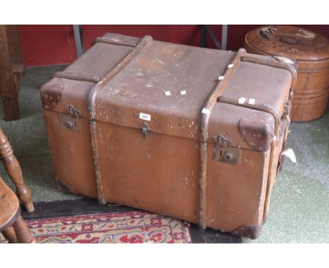 A vintage wood bound travel trunk, bears LMS Prestatyn