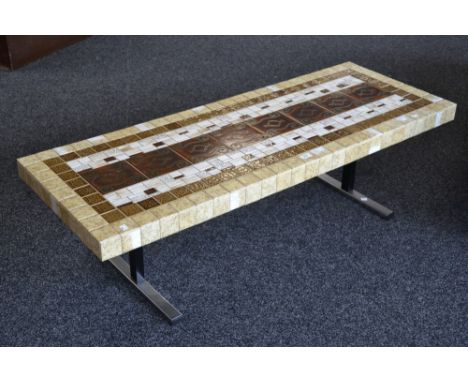 A retro tile top and chrome coffee table.