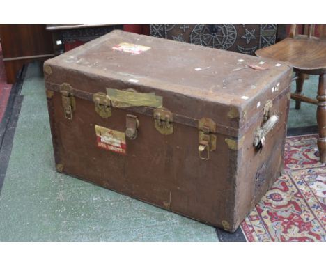 A vintage travel trunk bears Canadian Pacific label for The Empress of Canada dated 11 Jan 1952.