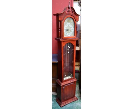 A reproduction mahogany longcase clock