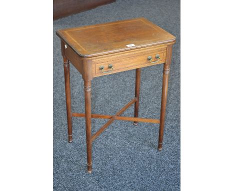 An Edwardian mahogany rounded rectangular card table, folding top outlined with satinwood banding and barber pole stringing, 