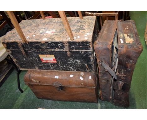 A dome topped tin travel trunk; a large wooden travel trunk; a fitted vintage leather travel case (3)