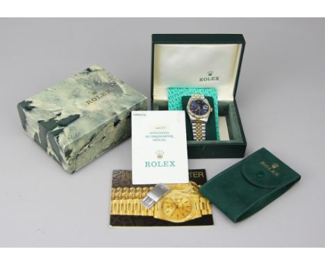 HAU "Rolex Oyster Perpetual Datejust 36"Gehäuse und Band Stahl teils mattiert und Gelbgold 18kt., geriffelte Lunette und Stel