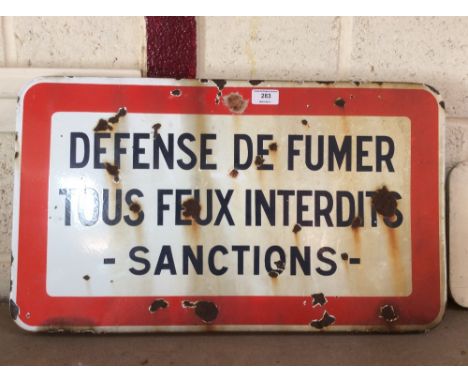 A French enamel sign "Defense de Fumer Tous Feux Interdits, Sanctions" 36cm x 50cm