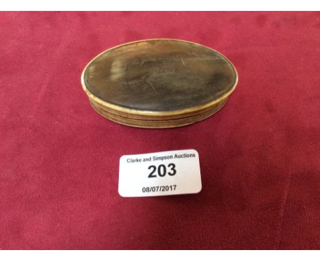 An antique oval horn snuff box