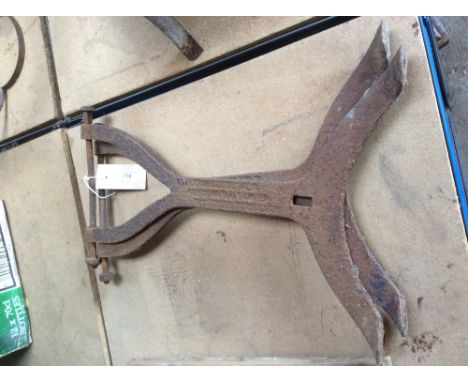 A pair of cast iron bench ends 