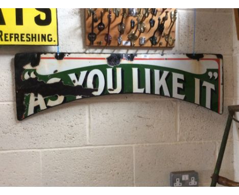 An enamel "As You like It" curved advertising sign, 102cm x 29cm in extremes