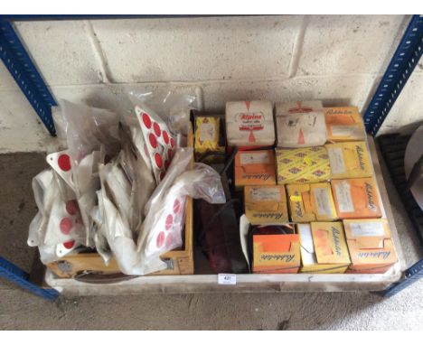 A quantity of various vintage boxed vehicle lights, reflectors etc.
