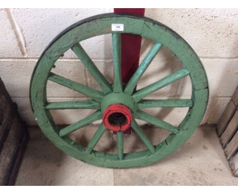 A vintage wooden and iron bound cartwheel, 75cm dia.