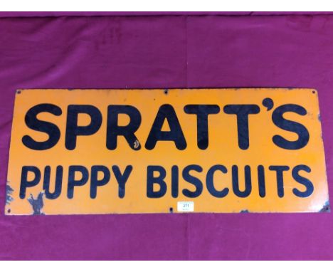 An enamel sign "Spratts Puppy Biscuits" 31cm x 76cm