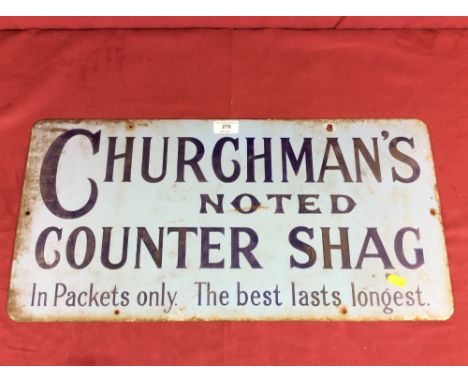 An enamel advertising sign for "Churchman's Noted Counter Shag" 30cm x 60cm