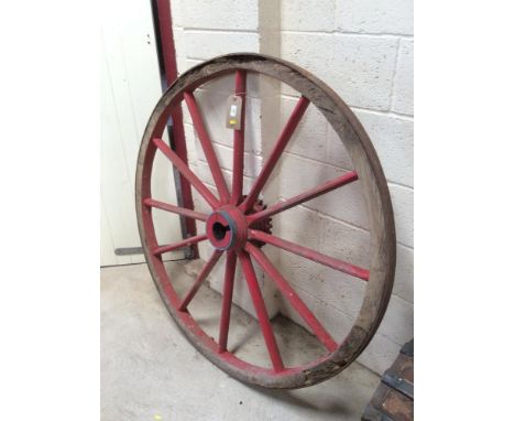 A vintage wooden and iron bound cartwheel, 135cm dia.